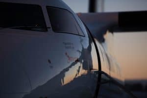 Close-up of an airplane at sunset.
